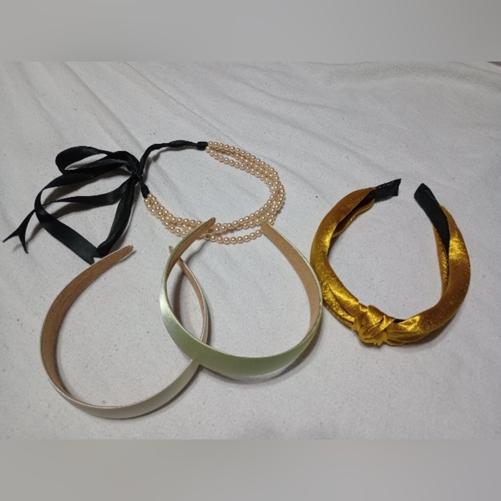 4 headbands, one Pearl and one gold knot
